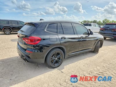 Trzecie zdjęcie samochodu z tyłu: 2019 BMW X3 SDRIVE30I VIN:5UXTR7C56KLF34352 - miniatura