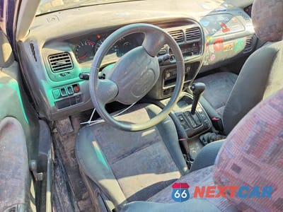 Zdjęcie 8 z 13 samochodu: 1999 CHEVROLET TRACKER VIN:2CNBJ18C3X6906067 - miniatura