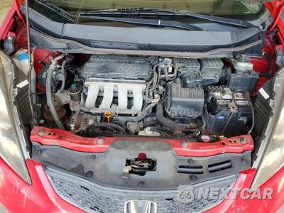 Zdjęcie 11 z 12 samochodu: 2009 HONDA FIT VIN:JHMGE88239S058088 - miniatura