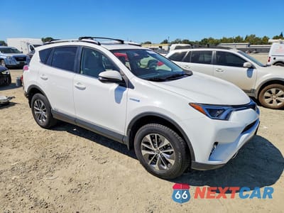 Czwarte zdjęcie samochodu z boku: 2018 TOYOTA RAV4 HYBRID XLE VIN:JTMRJREVXJD158188 - miniatura
