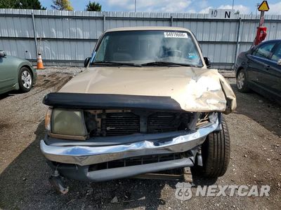 Piąte zdjęcie samochodu w środku: 1999 TOYOTA TACOMA BASE VIN:4TAVL52N6XZ417062 - miniatura