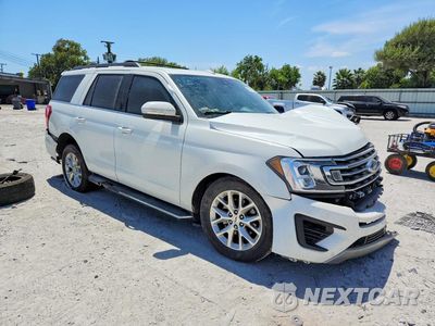Czwarte zdjęcie samochodu z boku: 2021 FORD EXPEDITION XLT VIN:1FMJU1HT0MEA02185 - miniatura