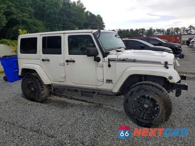 Czwarte zdjęcie samochodu z boku: 2014 JEEP WRANGLER UNLIMITED SAHARA VIN:1C4HJWEG8EL182450 - miniatura