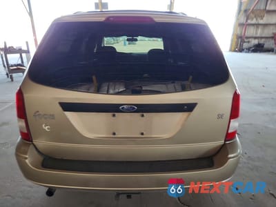Zdjęcie 6 z 13 samochodu: 2000 FORD FOCUS SE VIN:1FAFP3630YW229639 - miniatura