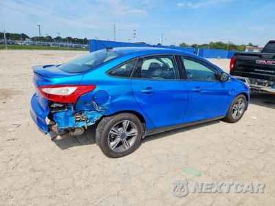 Trzecie zdjęcie samochodu z tyłu: 2014 FORD FOCUS SE VIN:1FADP3F27EL395779 - miniatura
