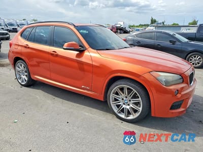 Czwarte zdjęcie samochodu z boku: 2013 BMW X1 SDRIVE28I VIN:WBAVM1C53DVW43813 - miniatura