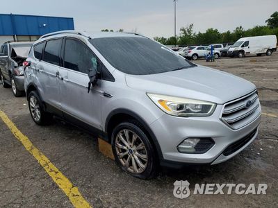 Czwarte zdjęcie samochodu z boku: 2018 FORD ESCAPE TITANIUM VIN:1FMCU0J98JUA08707 - miniatura