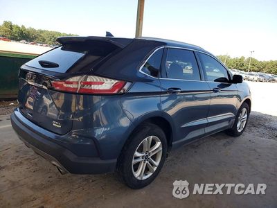 Trzecie zdjęcie samochodu z tyłu: 2019 FORD EDGE SEL VIN:2FMPK3J95KBC27236 - miniatura