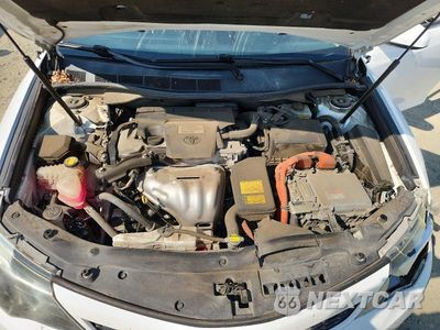 Zdjęcie 11 z 12 samochodu: 2014 TOYOTA CAMRY HYBRID SE VIN:4T1BD1FKXEU130830 - miniatura