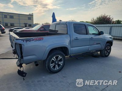 Trzecie zdjęcie samochodu z tyłu: 2019 TOYOTA TACOMA TRD SPORT VIN:3TMCZ5AN8KM282981 - miniatura
