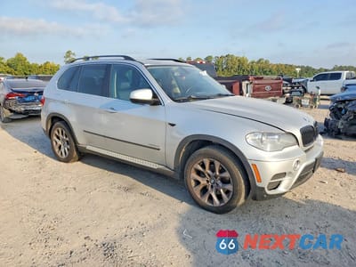 Czwarte zdjęcie samochodu z boku: 2013 BMW X5 XDRIVE35I VIN:5UXZV4C57D0E12642 - miniatura