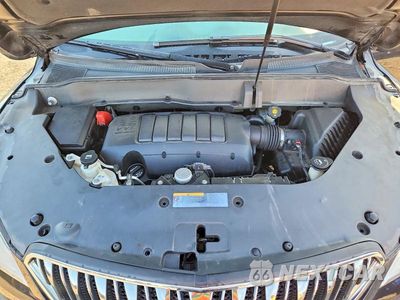 Zdjęcie 12 z 13 samochodu: 2013 BUICK ENCLAVE VIN:5GAKVDKD5DJ266973 - miniatura