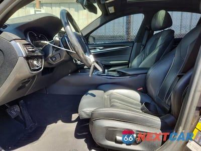 Zdjęcie 7 z 13 samochodu: 2018 BMW 530E VIN:WBAJA9C52JB034201 - miniatura