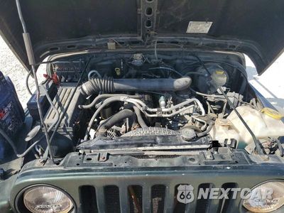 Zdjęcie 12 z 13 samochodu: 2005 JEEP WRANGLER X VIN:1J4FA39SX5P309724 - miniatura