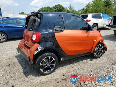 Trzecie zdjęcie samochodu z tyłu: 2016 SMART EQ FORTWO VIN:WMEFJ5DA5GK055745 - miniatura