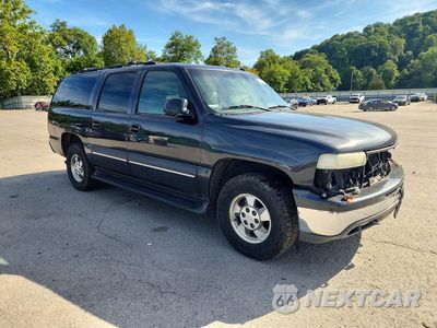 Czwarte zdjęcie samochodu z boku: 2002 CHEVROLET SUBURBAN C1500 VIN:3GNEC16Z42G308030 - miniatura