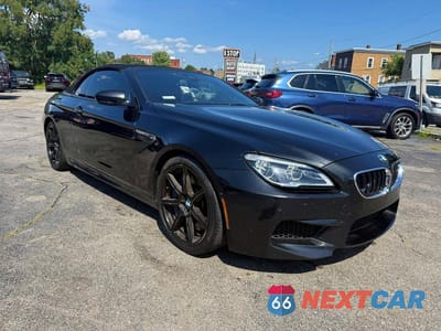 Czwarte zdjęcie samochodu z boku: 2016 BMW M6 VIN:WBS6G9C59GD932047 - miniatura