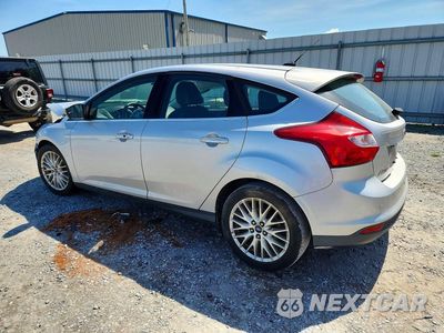 Drugie zdjęcie samochodu z przodu: 2014 FORD FOCUS TITANIUM VIN:1FADP3N24EL409932 - miniatura