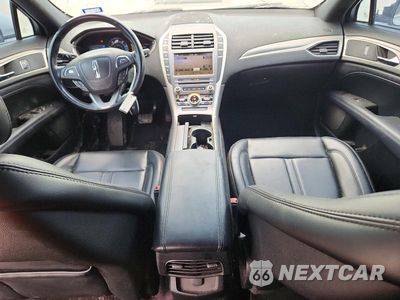 Zdjęcie 8 z 12 samochodu: 2017 LINCOLN MKZ HYBRID PREMIERE VIN:3LN6L5KU5HR646415 - miniatura