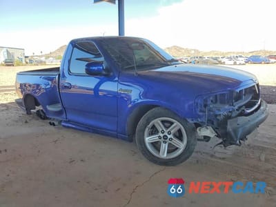 Czwarte zdjęcie samochodu z boku: 2004 FORD F150 SVT LIGHTNING VIN:2FTRF07334CA49262 - miniatura