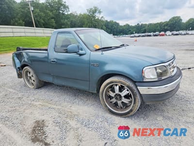Czwarte zdjęcie samochodu z boku: 1999 FORD F150 VIN:1FTZF1729XNA68877 - miniatura