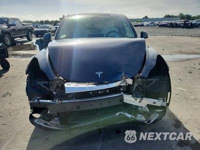 Piąte zdjęcie samochodu w środku: 2024 TESLA MODEL Y VIN:7SAYGDED3RA327010 - miniatura