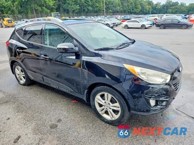 Czwarte zdjęcie samochodu z boku: 2013 HYUNDAI TUCSON GLS VIN:KM8JU3AC7DU715161 - miniatura