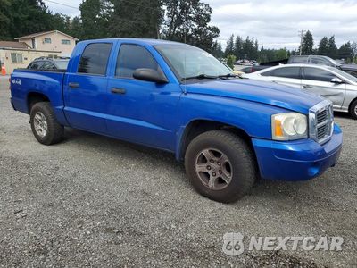 Czwarte zdjęcie samochodu z boku: 2007 DODGE DAKOTA QUAD SLT VIN:1D7HW48P37S171579 - miniatura