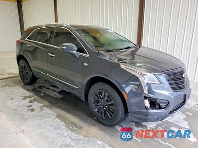 Czwarte zdjęcie samochodu z boku: 2021 CADILLAC XT5 PREMIUM LUXURY VIN:1GYKNCRSXMZ149351 - miniatura