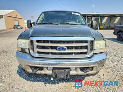Piąte zdjęcie samochodu w środku: 2004 FORD F350 SRW SUPER DUTY VIN:1FTSW31P84EA63215 - miniatura