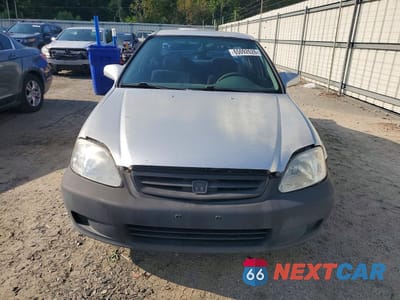 Piąte zdjęcie samochodu w środku: 1999 HONDA CIVIC LX VIN:1HGEJ6672XL014454 - miniatura