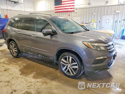 Czwarte zdjęcie samochodu z boku: 2016 HONDA PILOT TOURING VIN:5FNYF6H95GB103725 - miniatura