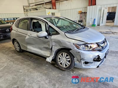 Czwarte zdjęcie samochodu z boku: 2016 HONDA FIT LX VIN:JHMGK5H51GX003480 - miniatura