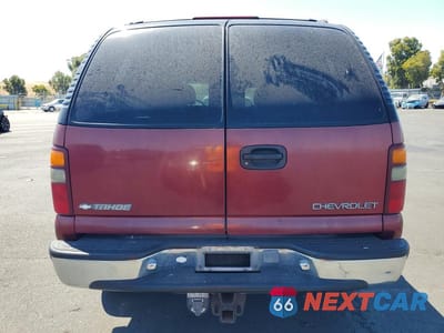 Zdjęcie 6 z 13 samochodu: 2001 CHEVROLET TAHOE C1500 VIN:1GNEC13T01J183704 - miniatura