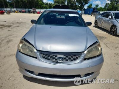 Piąte zdjęcie samochodu w środku: 2004 HONDA CIVIC LX VIN:1HGEM22574L063536 - miniatura