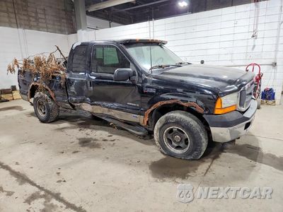 Czwarte zdjęcie samochodu z boku: 2001 FORD F250 SUPER DUTY VIN:1FTNX21F91EA91743 - miniatura