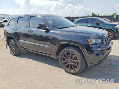 Czwarte zdjęcie samochodu z boku: 2021 JEEP GRAND CHEROKEE LAREDO VIN:1C4RJFAGXMC587783 - miniatura