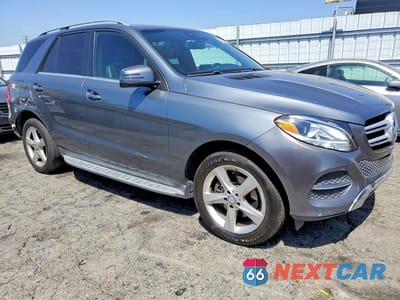 Czwarte zdjęcie samochodu z boku: 2017 MERCEDES-BENZ GLE 350 VIN:4JGDA5JB6HA880974 - miniatura