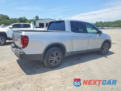 Trzecie zdjęcie samochodu z tyłu: 2018 HONDA RIDGELINE SPORT VIN:5FPYK3F15JB006708 - miniatura