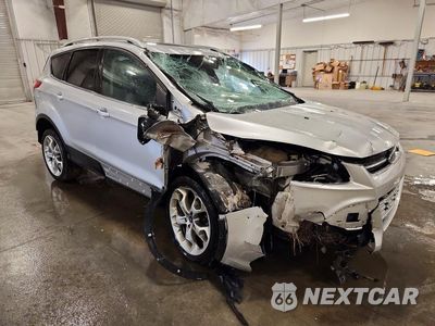 Czwarte zdjęcie samochodu z boku: 2014 FORD ESCAPE TITANIUM VIN:1FMCU9J92EUC50841 - miniatura