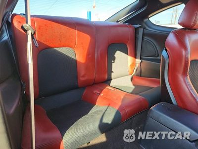Zdjęcie 10 z 12 samochodu: 2007 HYUNDAI TIBURON GT VIN:KMHHN66F47U251864 - miniatura