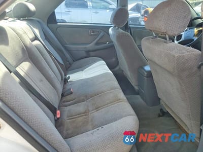 Zdjęcie 10 z 12 samochodu: 2001 TOYOTA CAMRY LE VIN:4T1BG22K11U764797 - miniatura