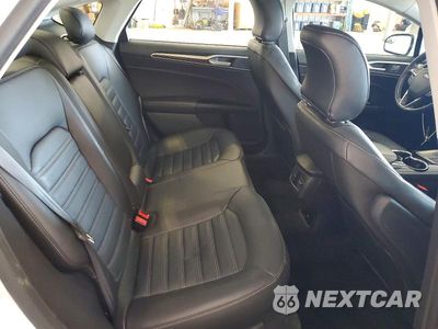 Zdjęcie 10 z 13 samochodu: 2016 FORD FUSION SE PHEV VIN:3FA6P0PU1GR280932 - miniatura