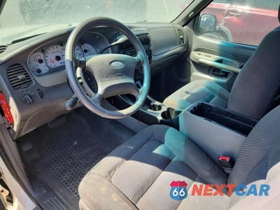 Zdjęcie 8 z 12 samochodu: 2002 FORD EXPLORER SPORT TRAC VIN:1FMZU67E22UD26793 - miniatura