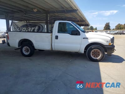 Czwarte zdjęcie samochodu z boku: 2002 FORD F250 SUPER DUTY VIN:1FTNF20L02EA17719 - miniatura
