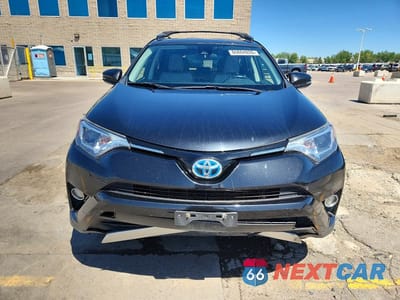 Piąte zdjęcie samochodu w środku: 2017 TOYOTA RAV4 HYBRID XLE VIN:JTMRJREV3HD111336 - miniatura