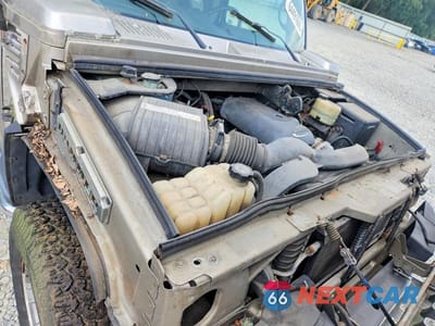 Zdjęcie 12 z 13 samochodu: 2004 HUMMER H2 VIN:5GRGN23U64H117419 - miniatura