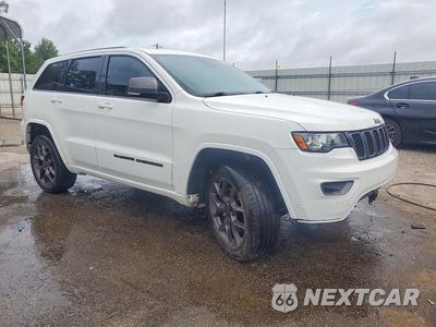 Czwarte zdjęcie samochodu z boku: 2021 JEEP GRAND CHEROKEE LIMITED VIN:1C4RJFBG4MC666509 - miniatura
