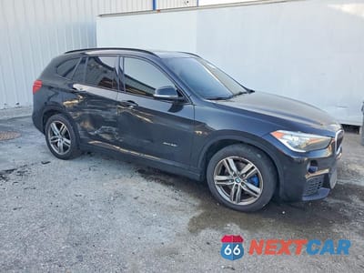 Czwarte zdjęcie samochodu z boku: 2016 BMW X1 XDRIVE28I VIN:WBXHT3C37G5E52841 - miniatura