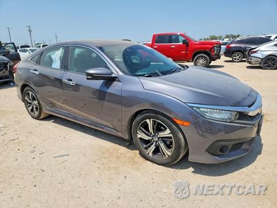 Czwarte zdjęcie samochodu z boku: 2016 HONDA CIVIC TOURING VIN:2HGFC1F93GH636593 - miniatura